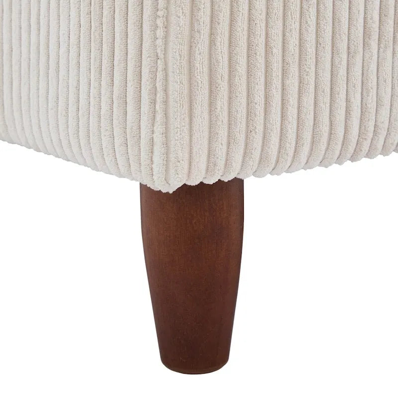 Ottoman moderno rivestito in velluto a coste con gambe in legno