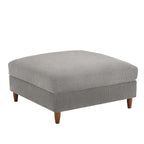 Ottoman moderno rivestito in velluto a coste con gambe in legno