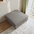 Ottoman moderno rivestito in velluto a coste con gambe in legno