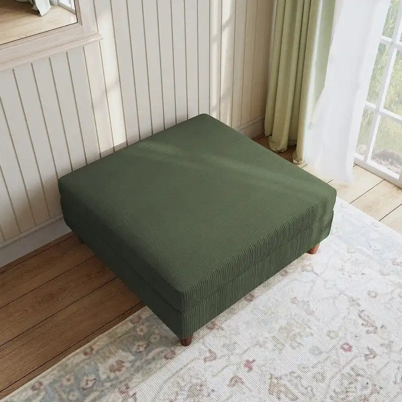 Ottoman moderno rivestito in velluto a coste con gambe in legno