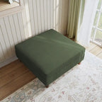 Ottoman moderno rivestito in velluto a coste con gambe in legno