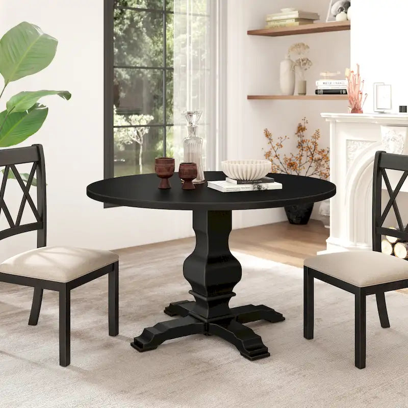 Tavolo da pranzo rotondo con base a piedistallo